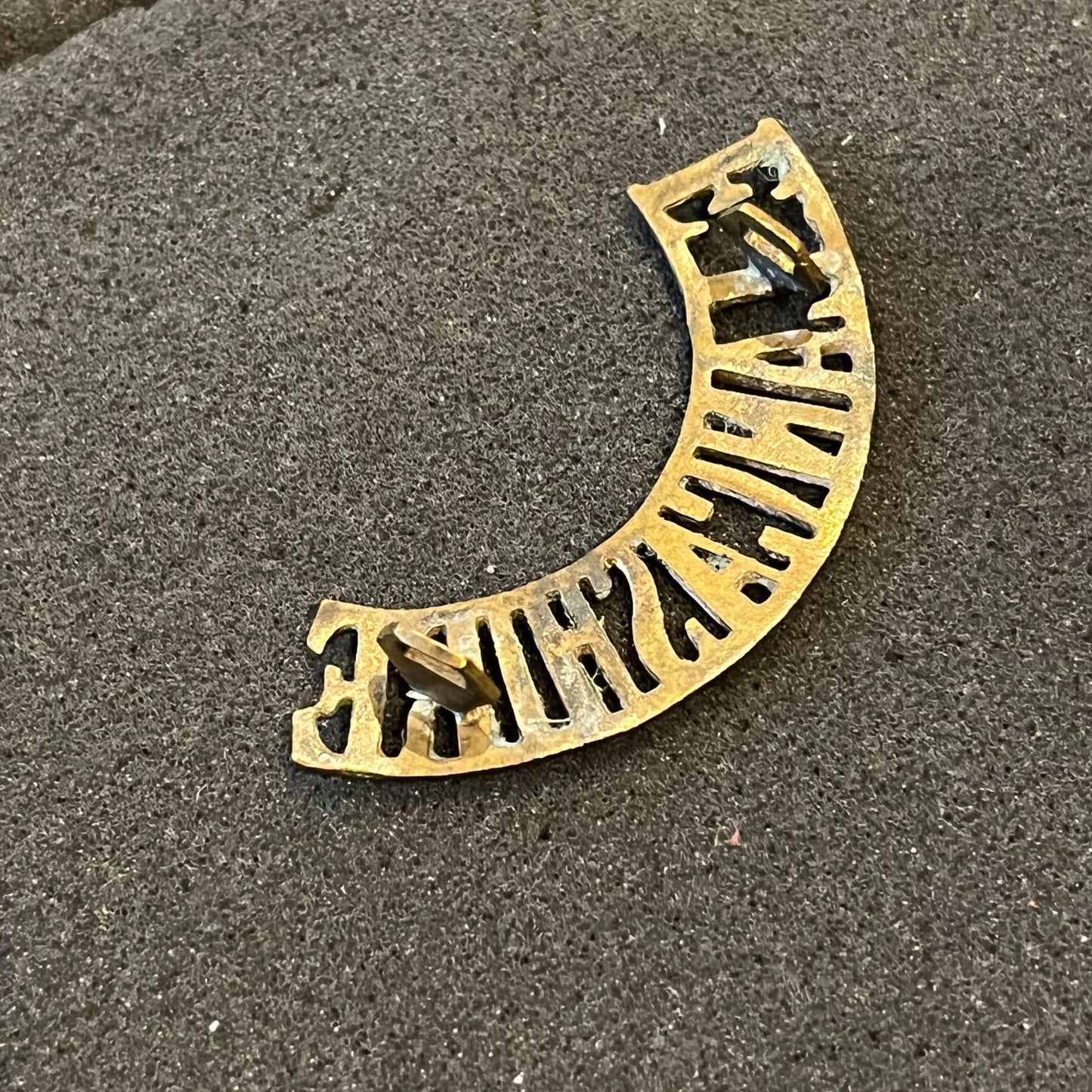 WW1 East Lancashire brass shoulder title