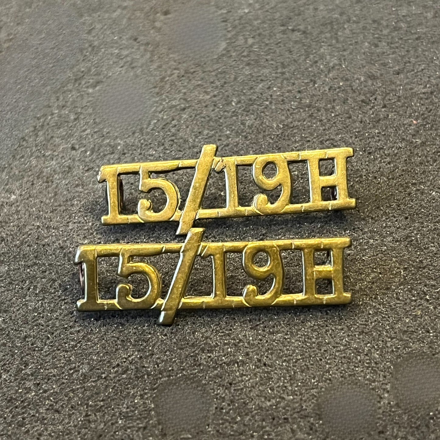 15/19 Hussars brass shoulder titles titles