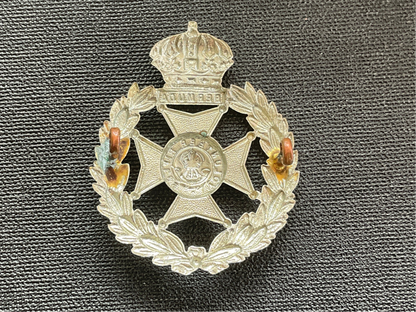 Bermuda Volunteers cap badge.