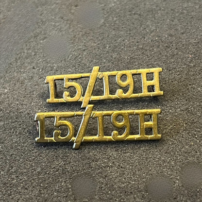 15/19 Hussars brass shoulder titles titles