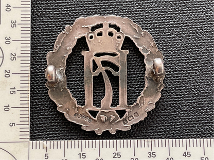 1942 hallmarked Free Norwegian Army cap badge