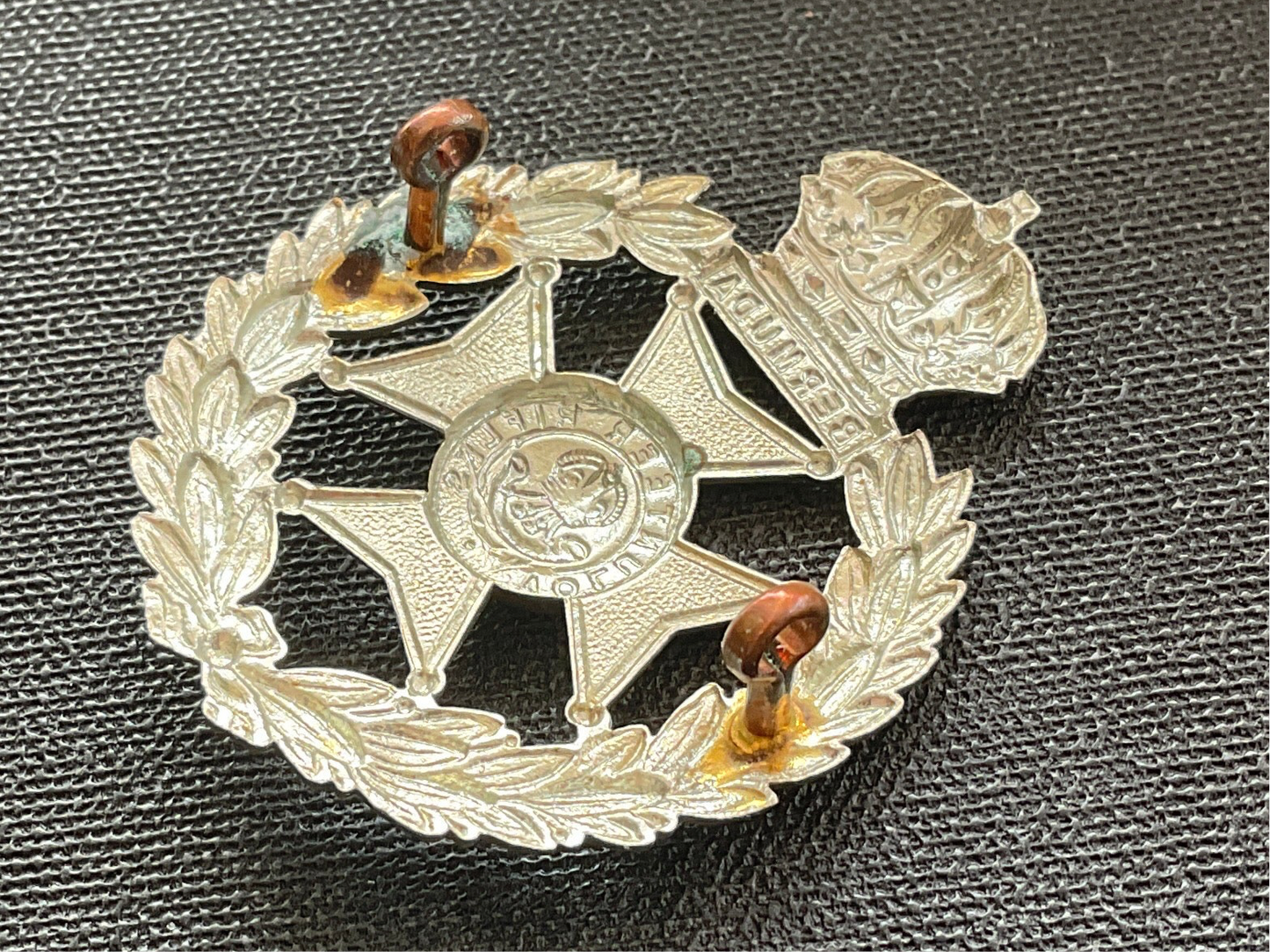 Bermuda Volunteers cap badge.