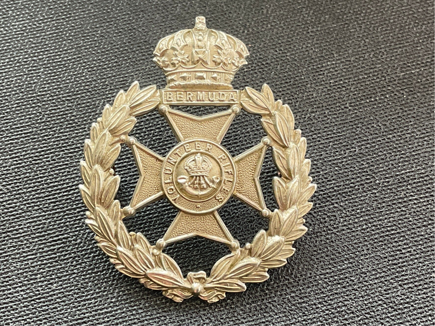 Bermuda Volunteers cap badge.